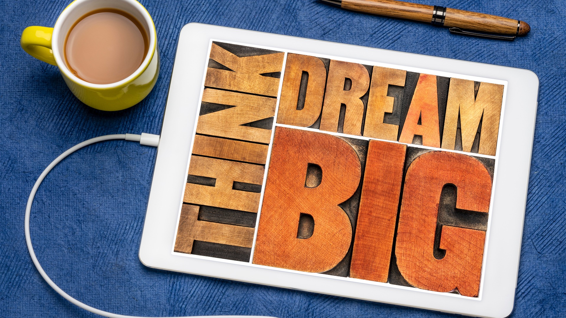 A picture with the slogan "Think and dream big" about your cycling goals