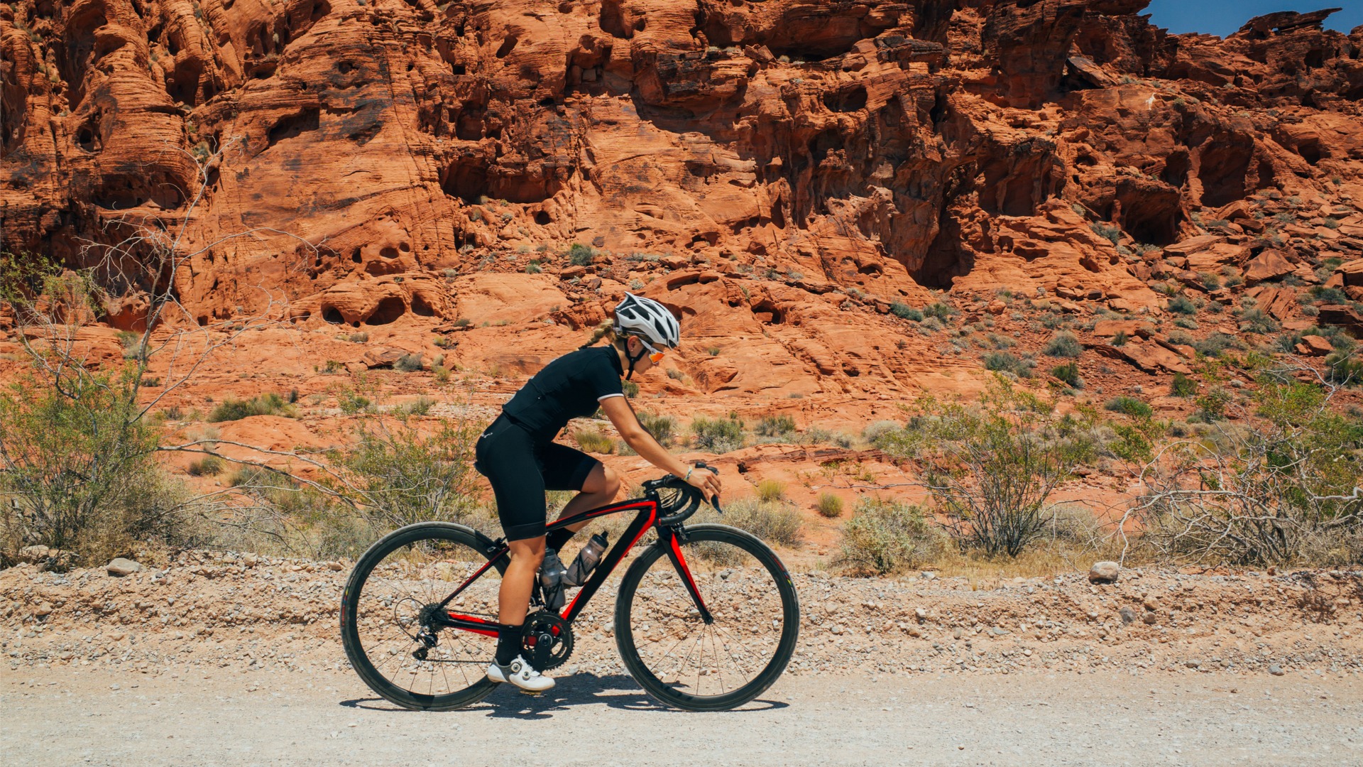 A female cyclist partaking in cycling heat training